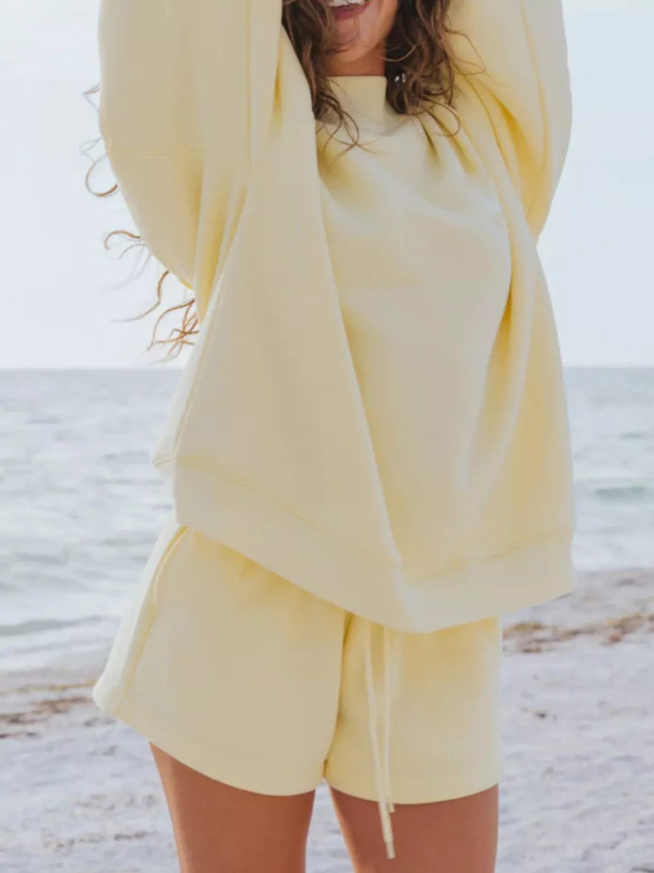 Pale yellow oversized relaxed fit round neck sweatshirt with long sleeves
