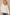 POL V-Neck knit Panel Exposed Seam Top Cream