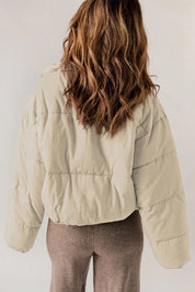 Beige zip-up collared puffer jacket with ruffled cropped sleeves