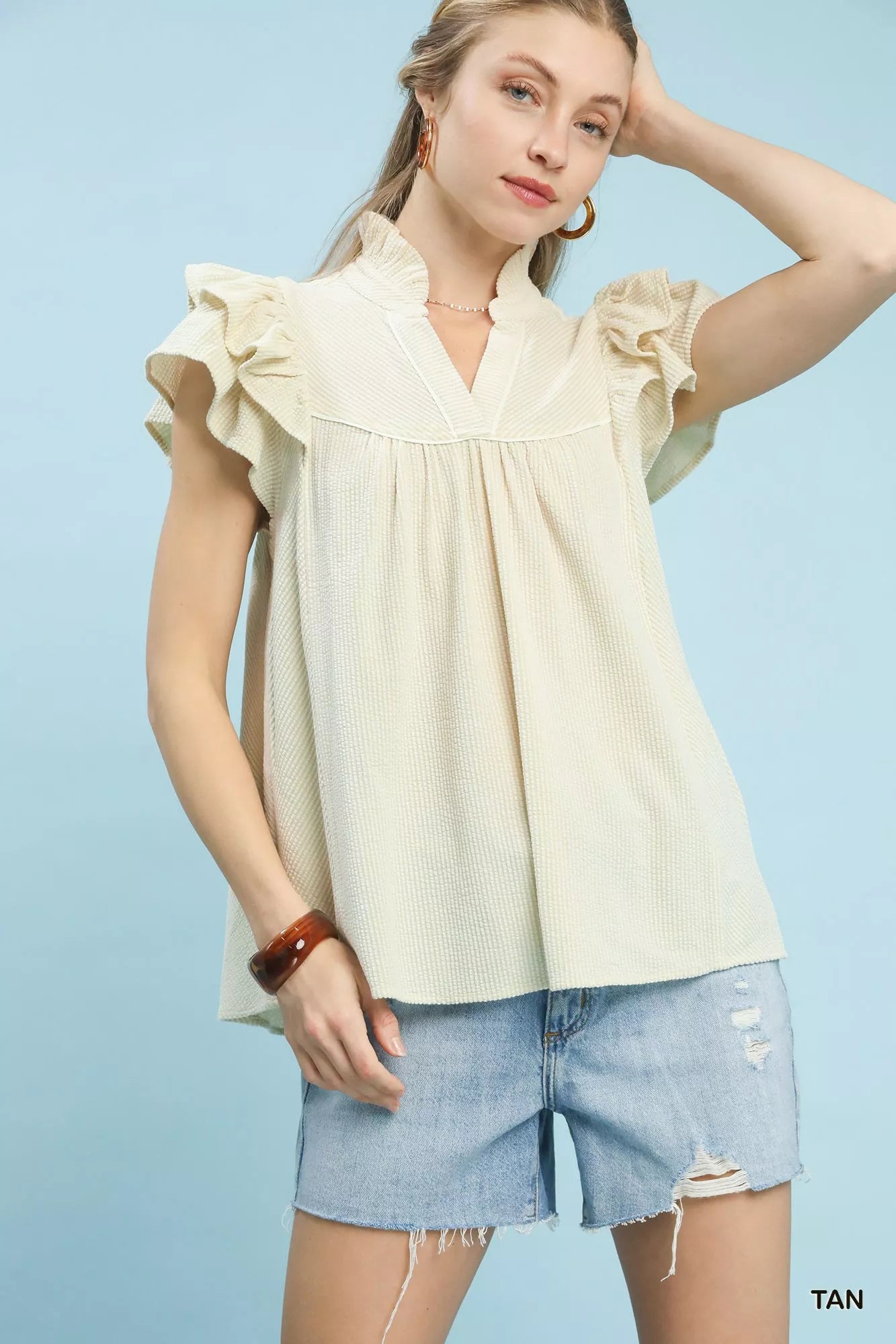 Beige ribbed Umgee ruffled sleeve textured blouse with v-neckline