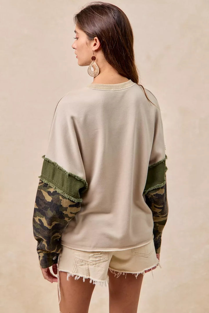 BiBi Camo Sleeve French Terry Top with Frayed Edge | Daverri Fashions