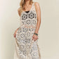 Cream-colored ADORA crochet cover-up tunic with circular patterns and scalloped hem