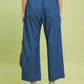 Back view of Umgee denim wide leg crop pants with high-waisted elastic waistband and back pockets