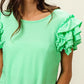 BiBi Birdseye Texture Layered Ruffle Top in vibrant mint green waffle-knit fabric