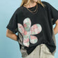 Umgee Ash black oversized mineral wash French terry top with pink green white flower patchwork