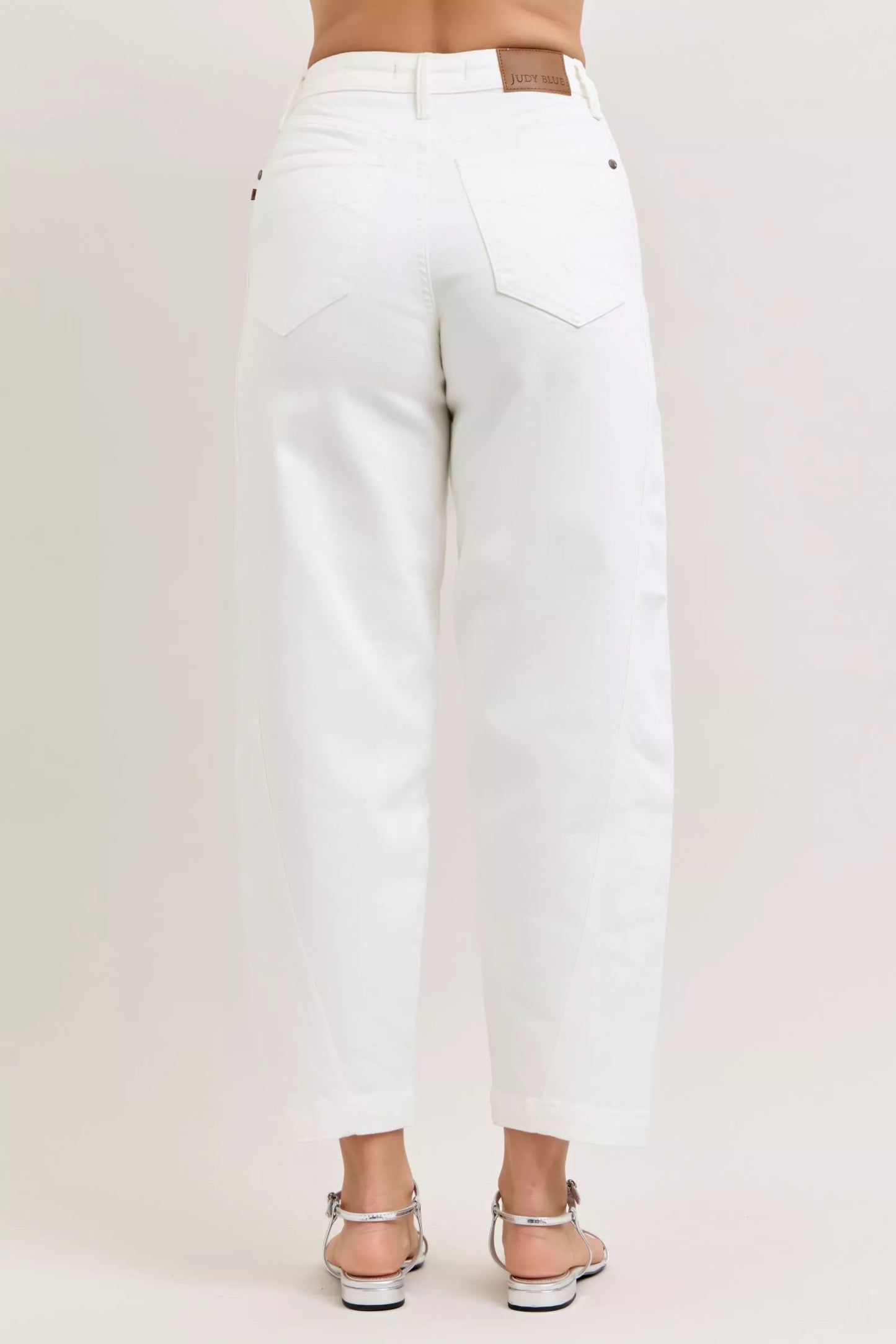 Judy Blue high-waisted rigid magic panel barrel jeans in white denim