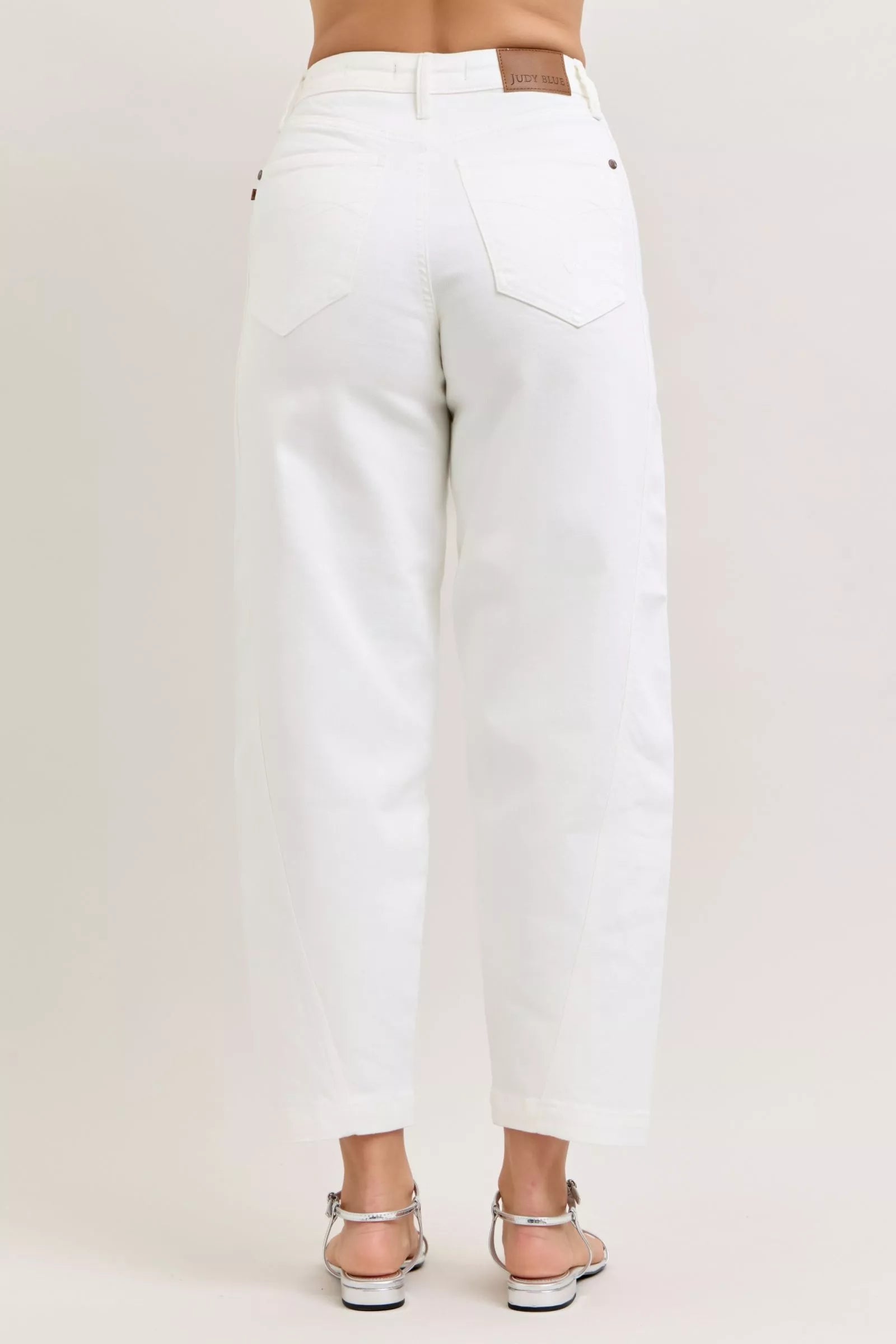 Judy Blue high-waisted rigid magic panel barrel jeans in white denim