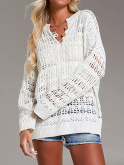 White loose-knit cover up with lace openwork and wooden button neckline