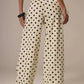 Daverri Polka Dot Wide Leg Jeans in cream with black polka dots