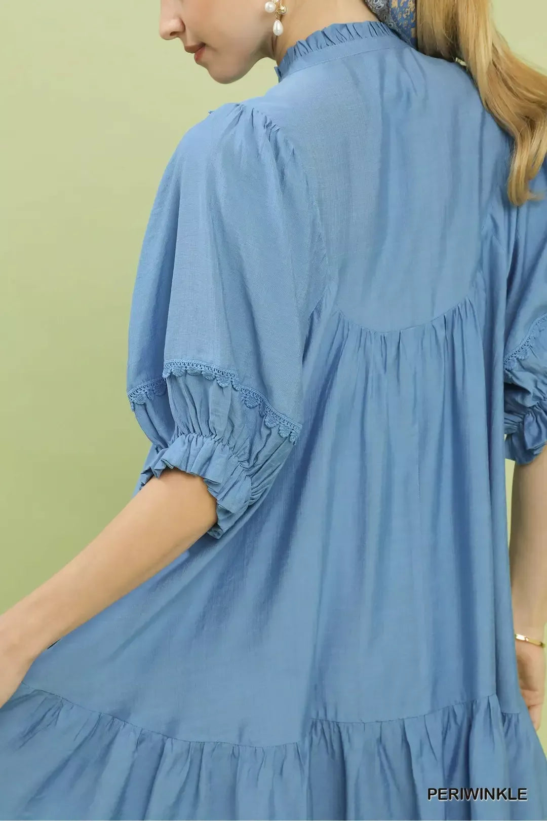 Umgee smocked bib ruffle hem babydoll dress in soft blue with puffed sleeves and lace trim