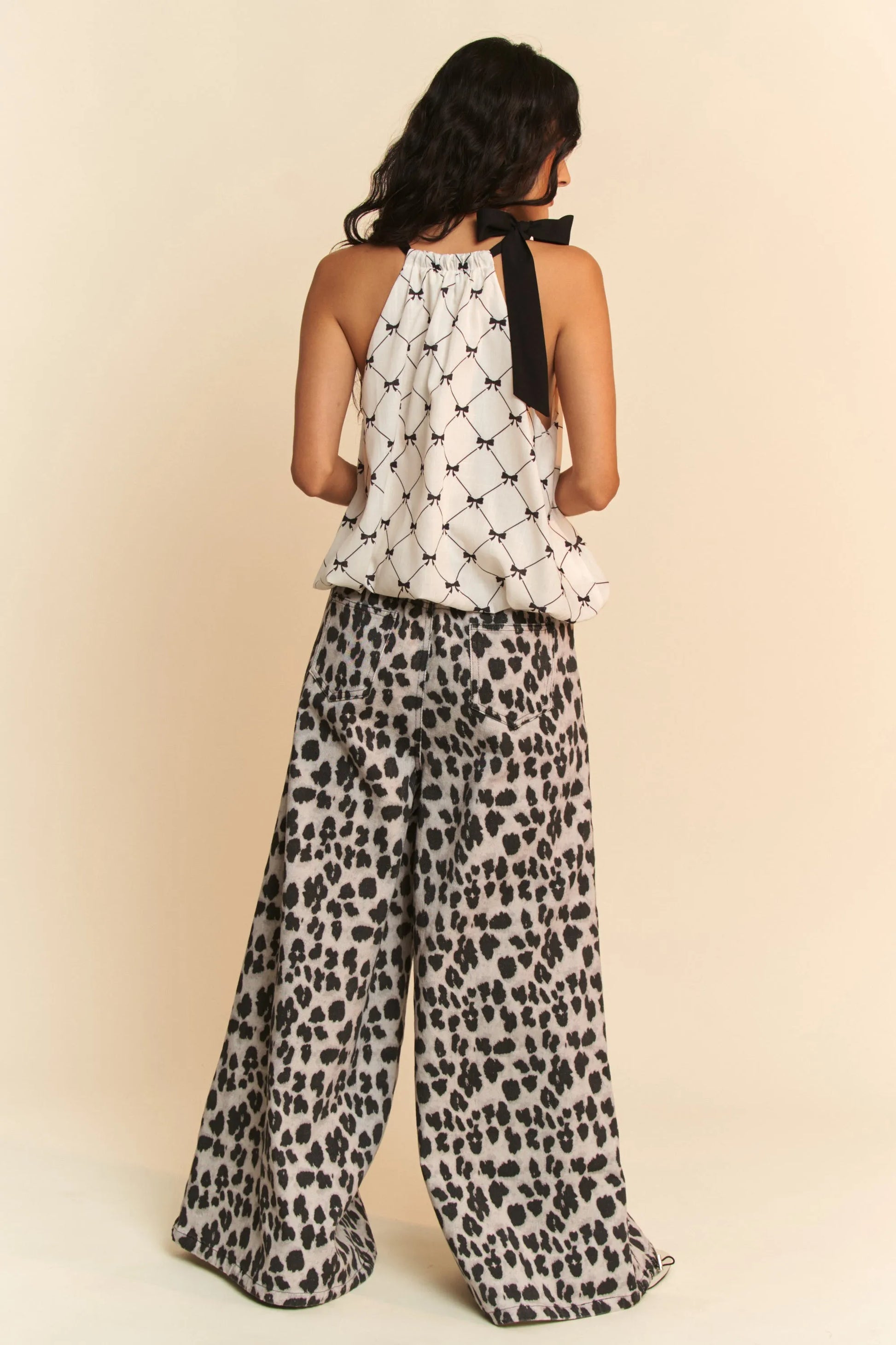Davi & Dani ribbon checker printed tie halter neck blouse top in black and white lattice design with bow