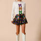 SO ME Mardi Gras Checker Sequins Mini Skirt in white with purple green gold checks