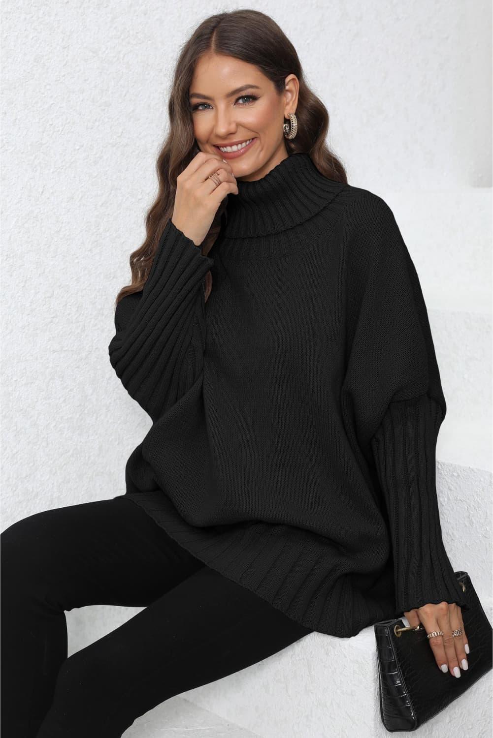 Black turtleneck sweater with bell sleeves and ribbed cuffs