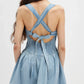 Daverri smocked crisscross back denim mini dress in light blue