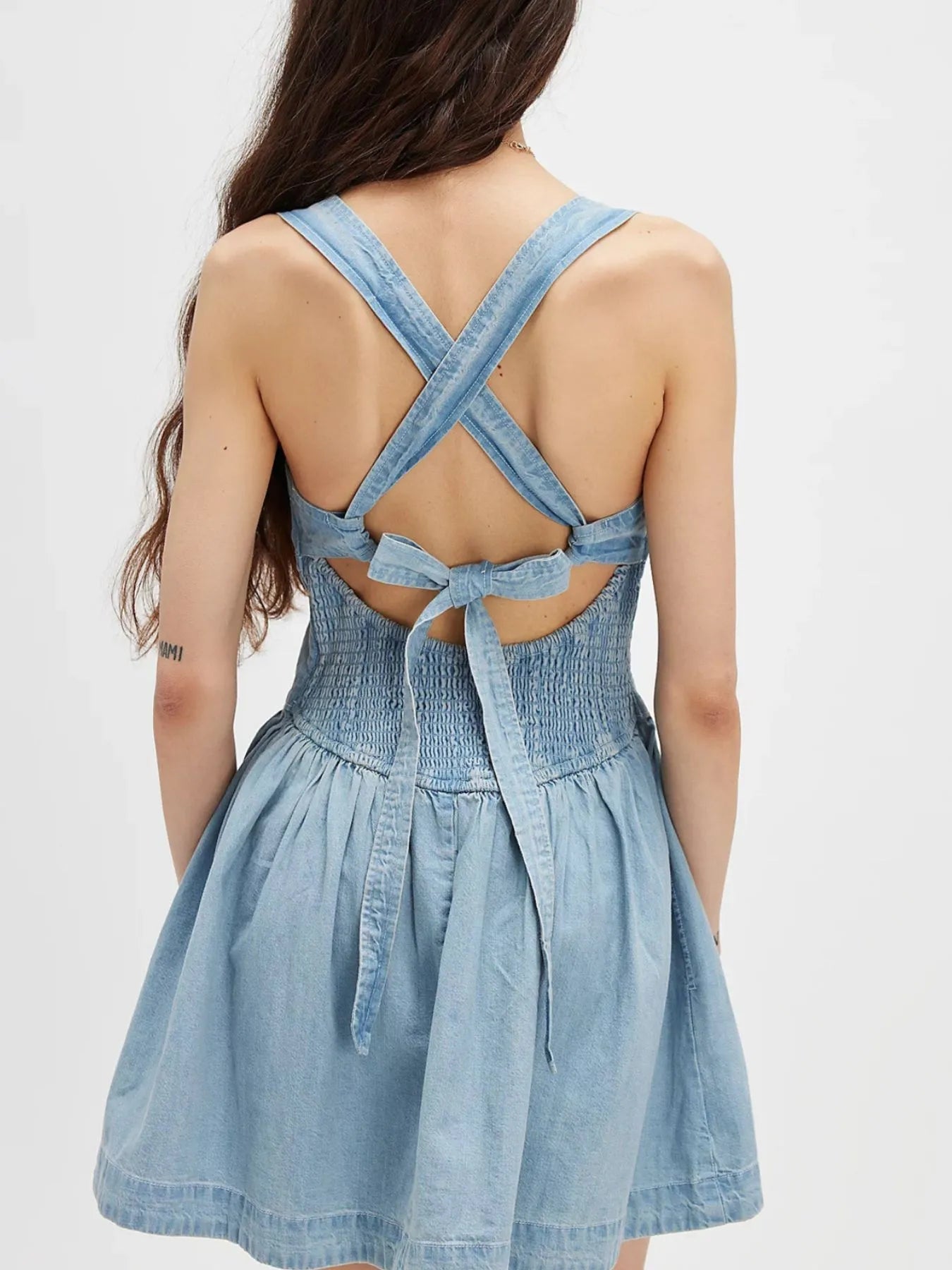 Daverri smocked crisscross back denim mini dress in light blue