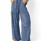 Tiered wide-leg washed pants in blue textured denim patchwork