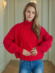 Red oversized cable-knit turtleneck sweater with balloon sleeves