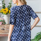 Heimish Short Sleeve Crisscross Star Babydoll Top