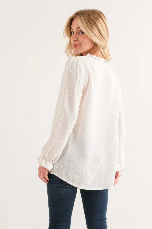 White lace polka dot ruffle blouse with long sleeves and button-down front