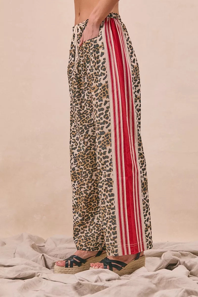 BiBi Leopard Print Pants with red white side stripes and welt pockets
