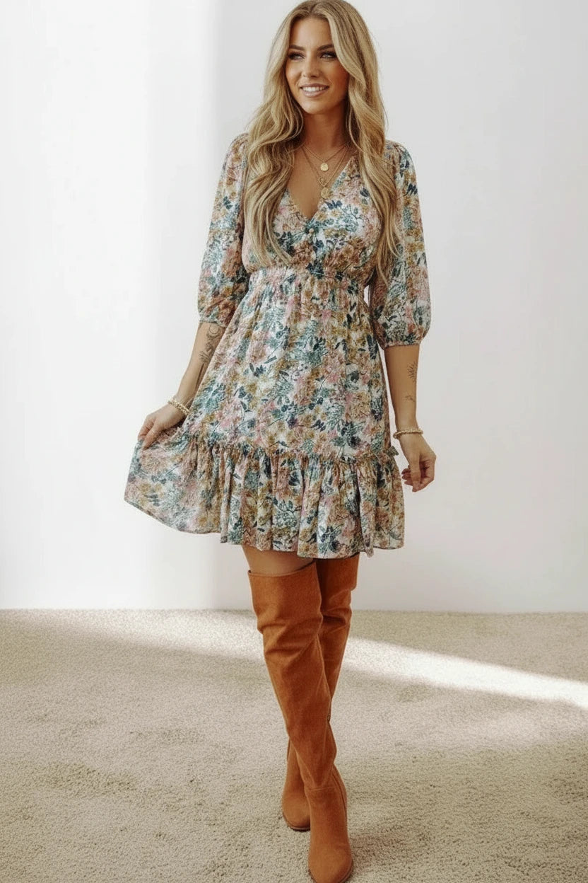 Floral printed V-neck mini dress with 3/4 sleeves and ruffled hem