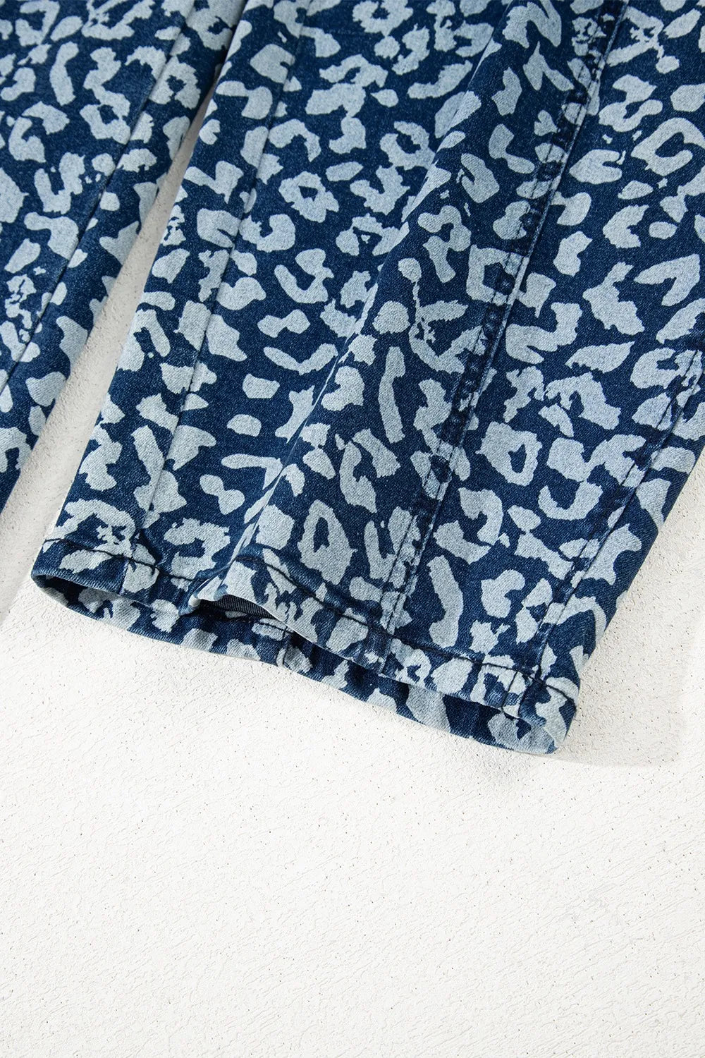 Blue and white leopard print pajama pants with elastic waistband