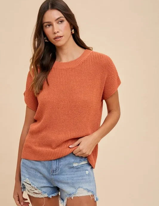 Burnt orange textured knit short sleeve top with distressed denim shorts