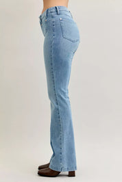 Light blue Judy Blue mid-rise bootcut jeans with brown boots