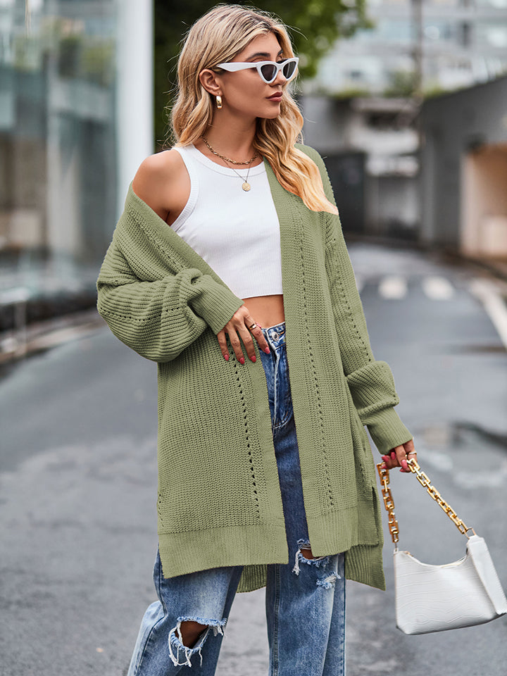 Olive green long sleeve waffle-knit cardigan with open shoulder design