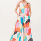 And The Why Tied Shoulder Straps Wide-Leg Geo Print Jumpsuit Jumpsuits