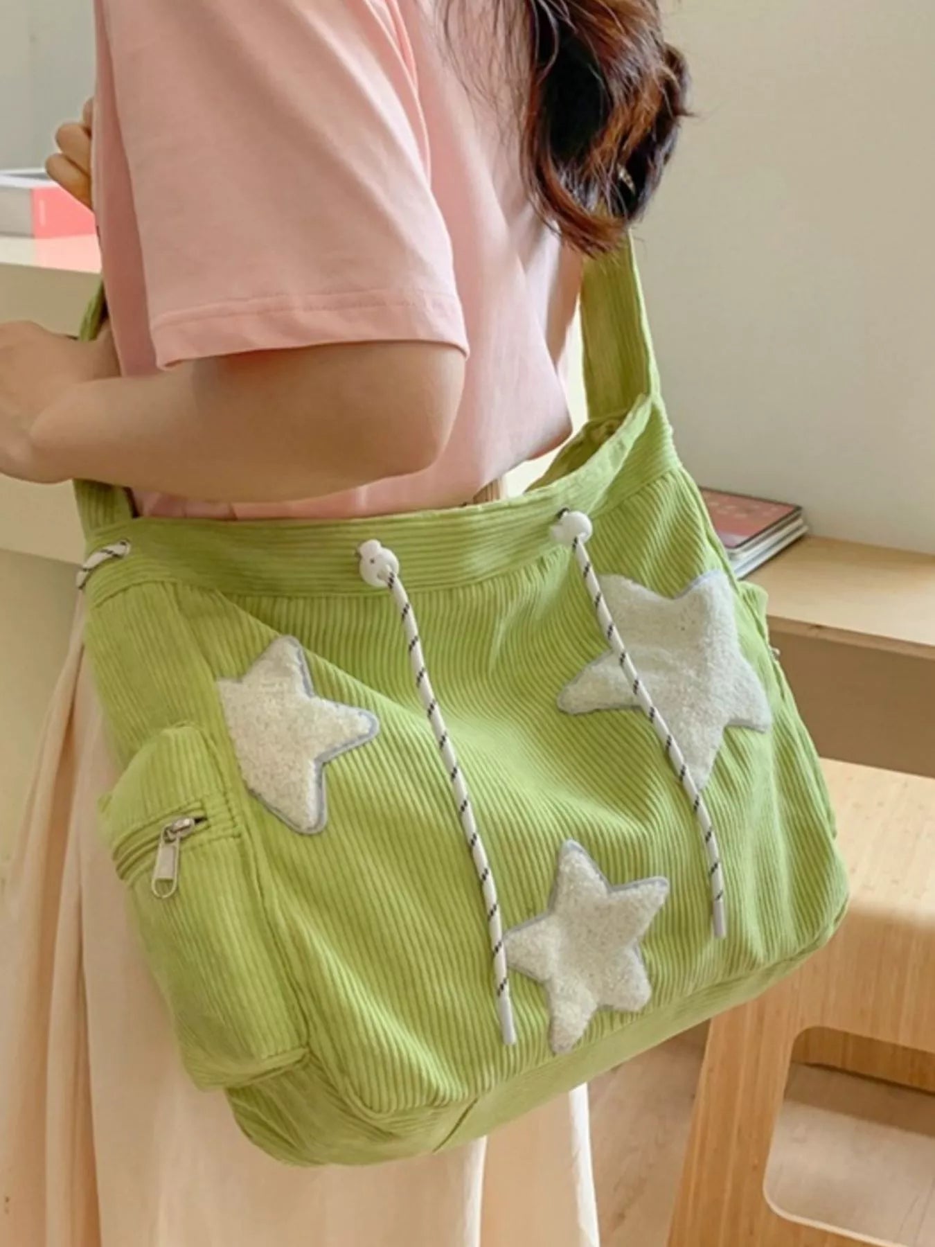 Lime green corduroy star applique casual crossbody bag with striped drawstrings