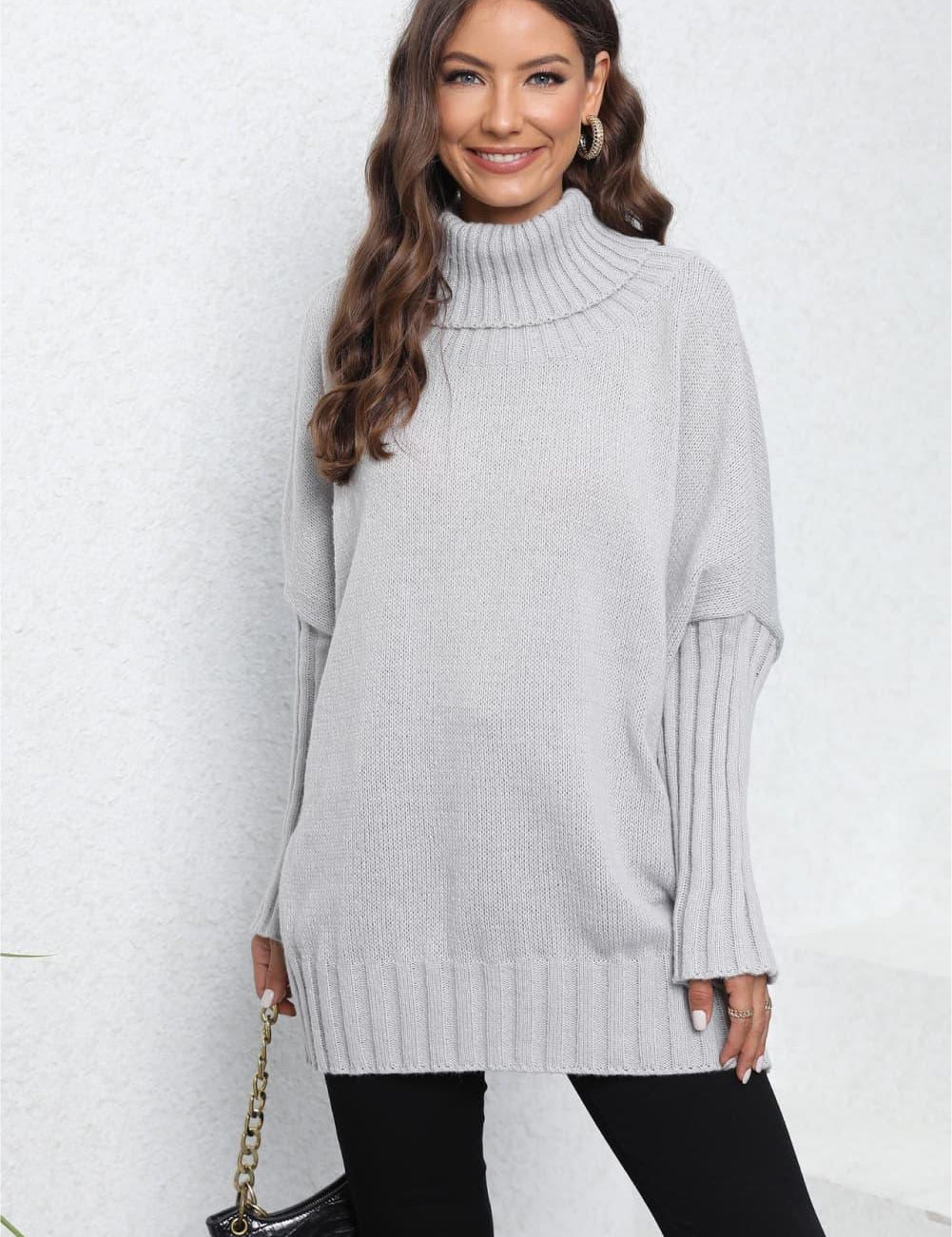 Light gray ribbed turtleneck sweater with bell sleeves