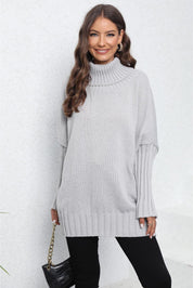 Light gray ribbed turtleneck sweater with bell sleeves