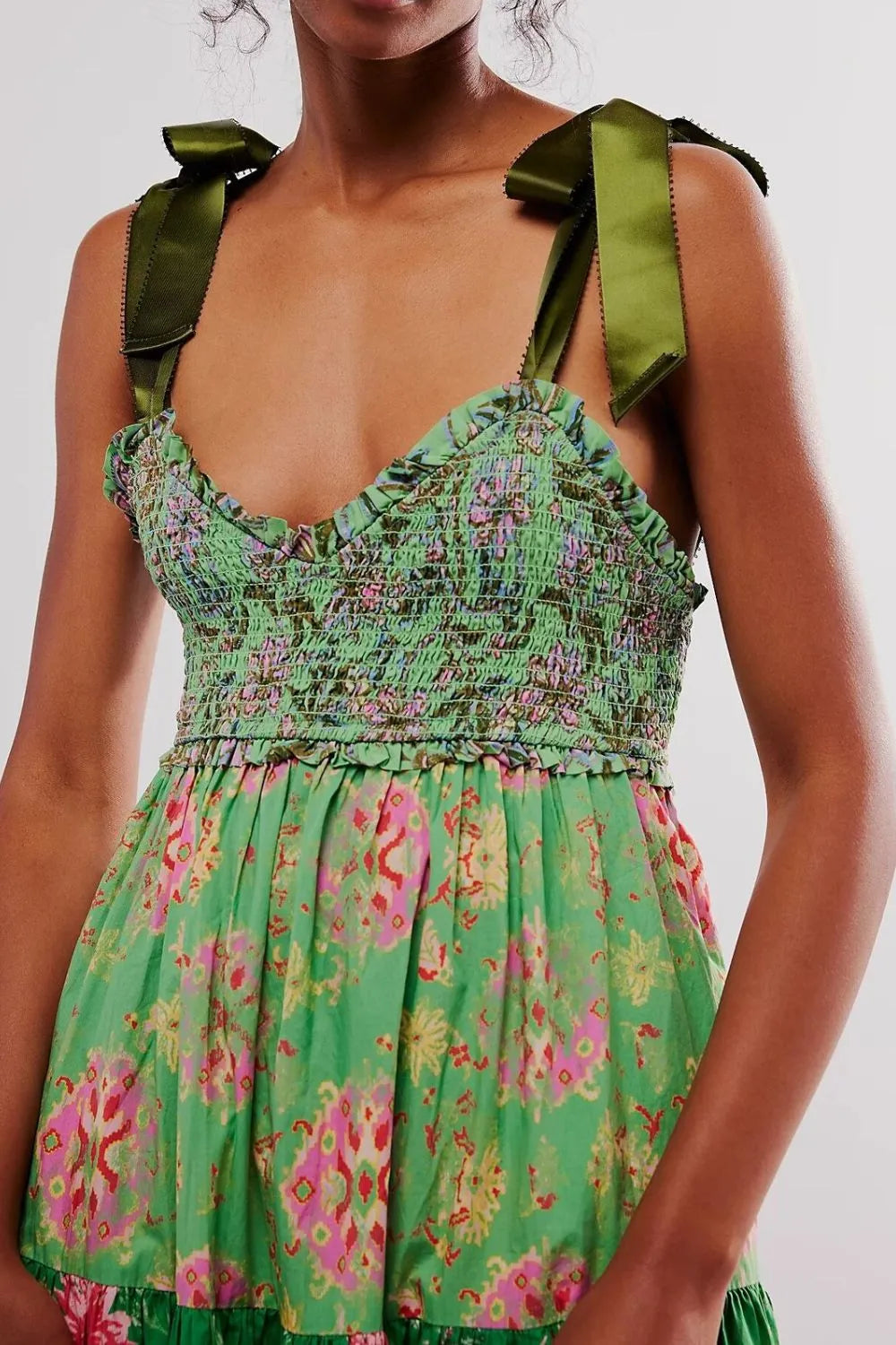 Vibrant green floral tiered maxi dress with smocked bodice and satin straps