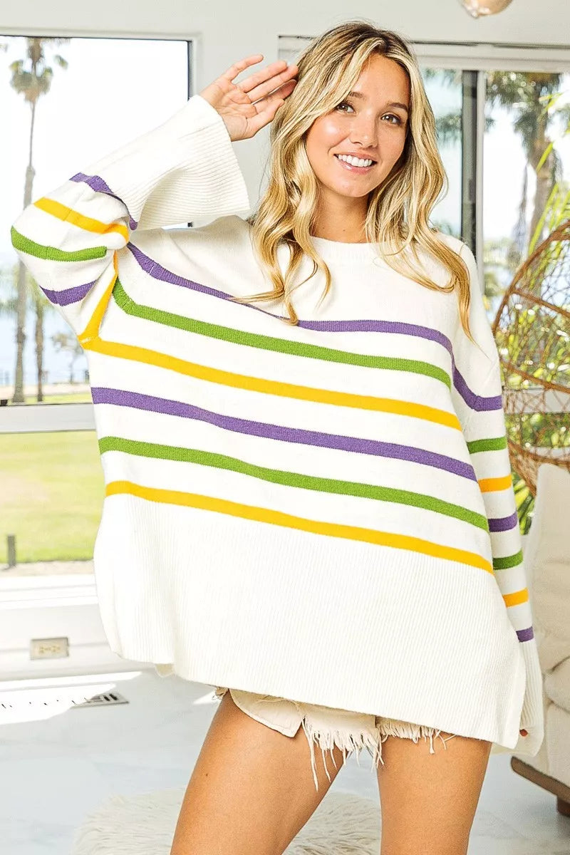 Cozy cream oversized knit sweater with purple and yellow Mardi Gras stripes