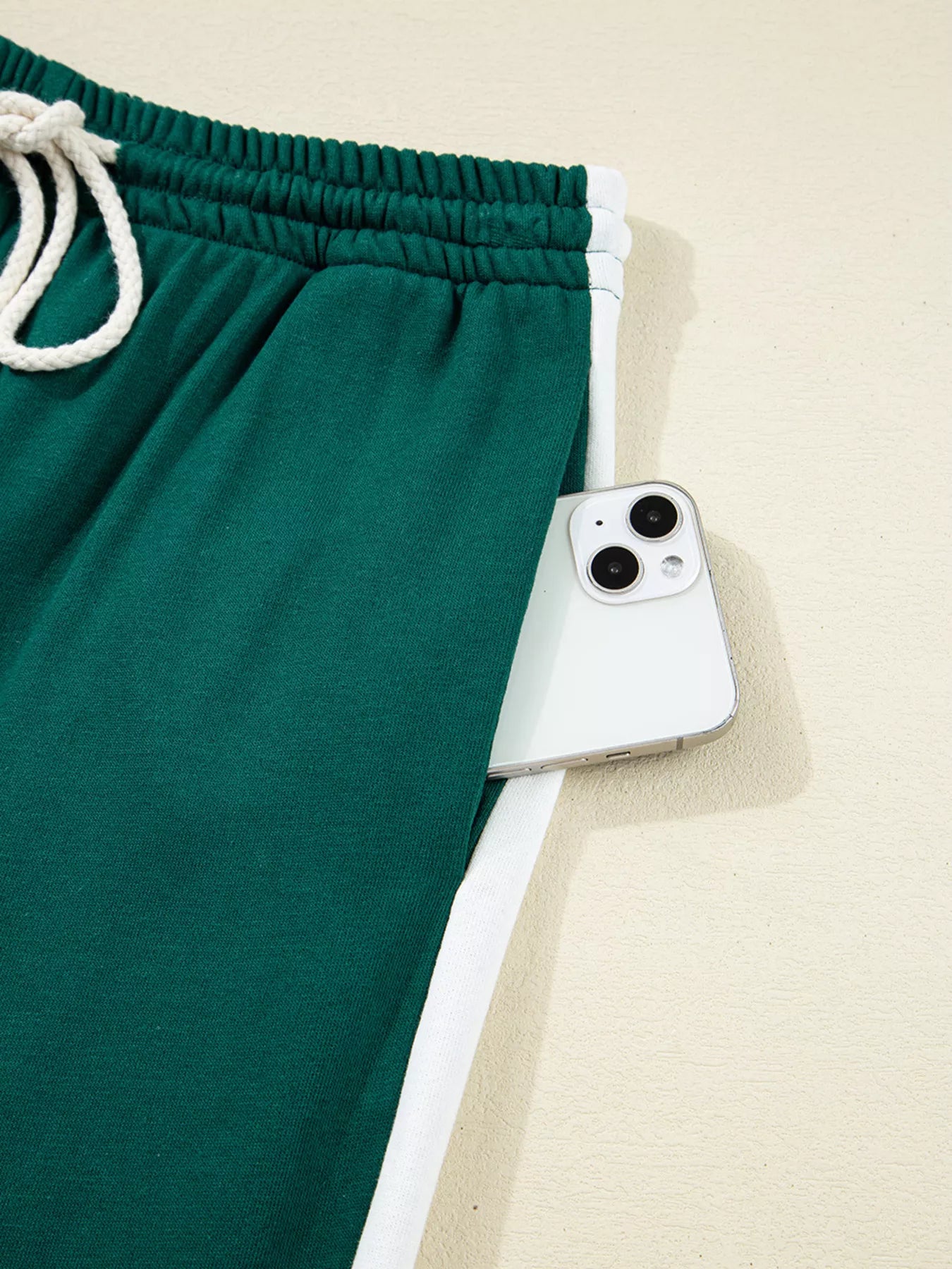Green drawstring sweatpants with white trim in Round Neck Top set