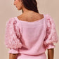 Soft pink ribbed knit SO ME Rosette Sleeves sweater with ruffled rose applique sleeves