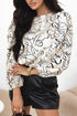 Beige abstract print balloon sleeve crew neck blouse on model