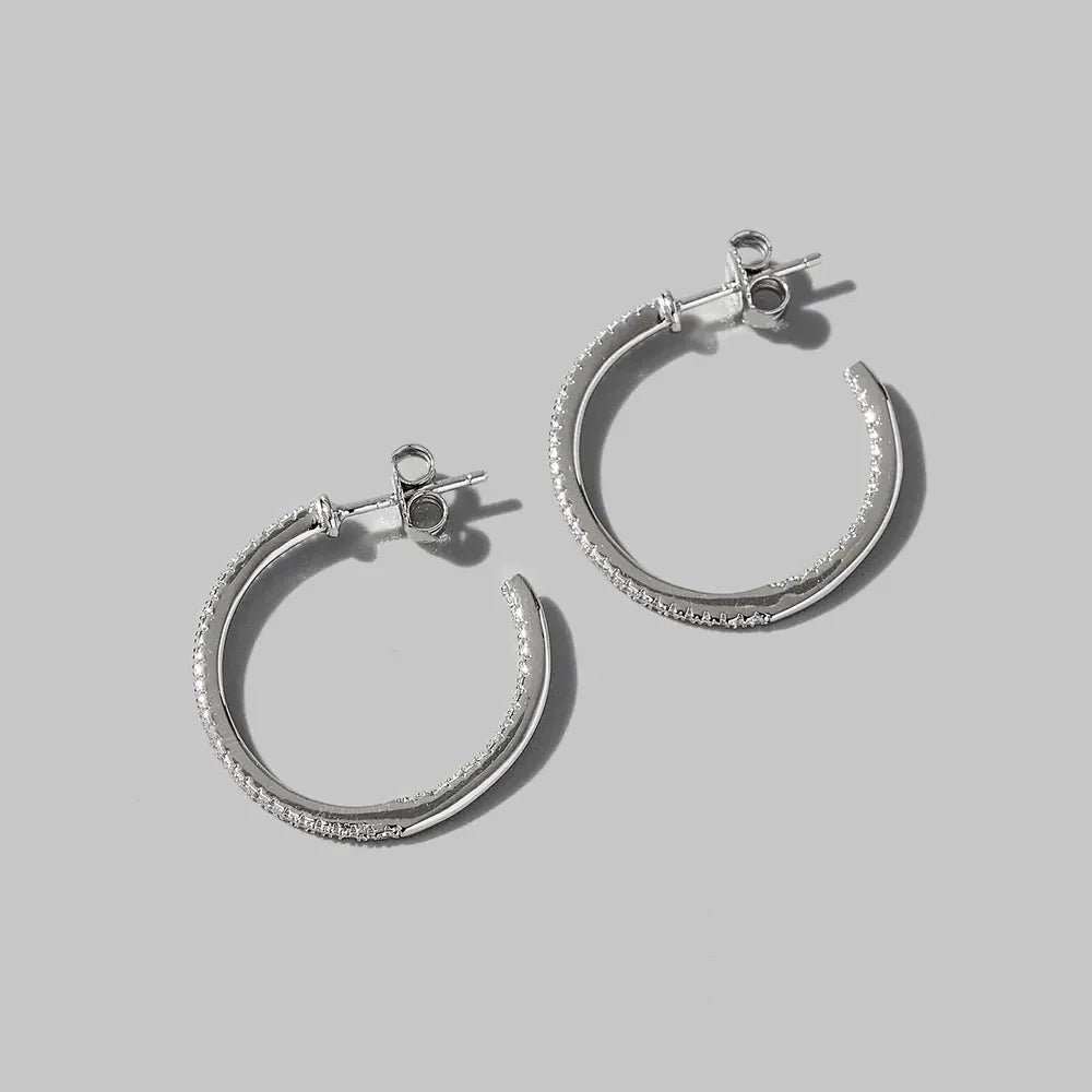 Silver textured C-hoop earrings with diamond accents in 925 sterling silver