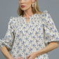 Umgee Ruffled Bow Print Notched Blouse - DAVERRI FASHIONS