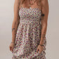 Multicolour bohemian ditsy floral smocked fit flare sundress in off-white