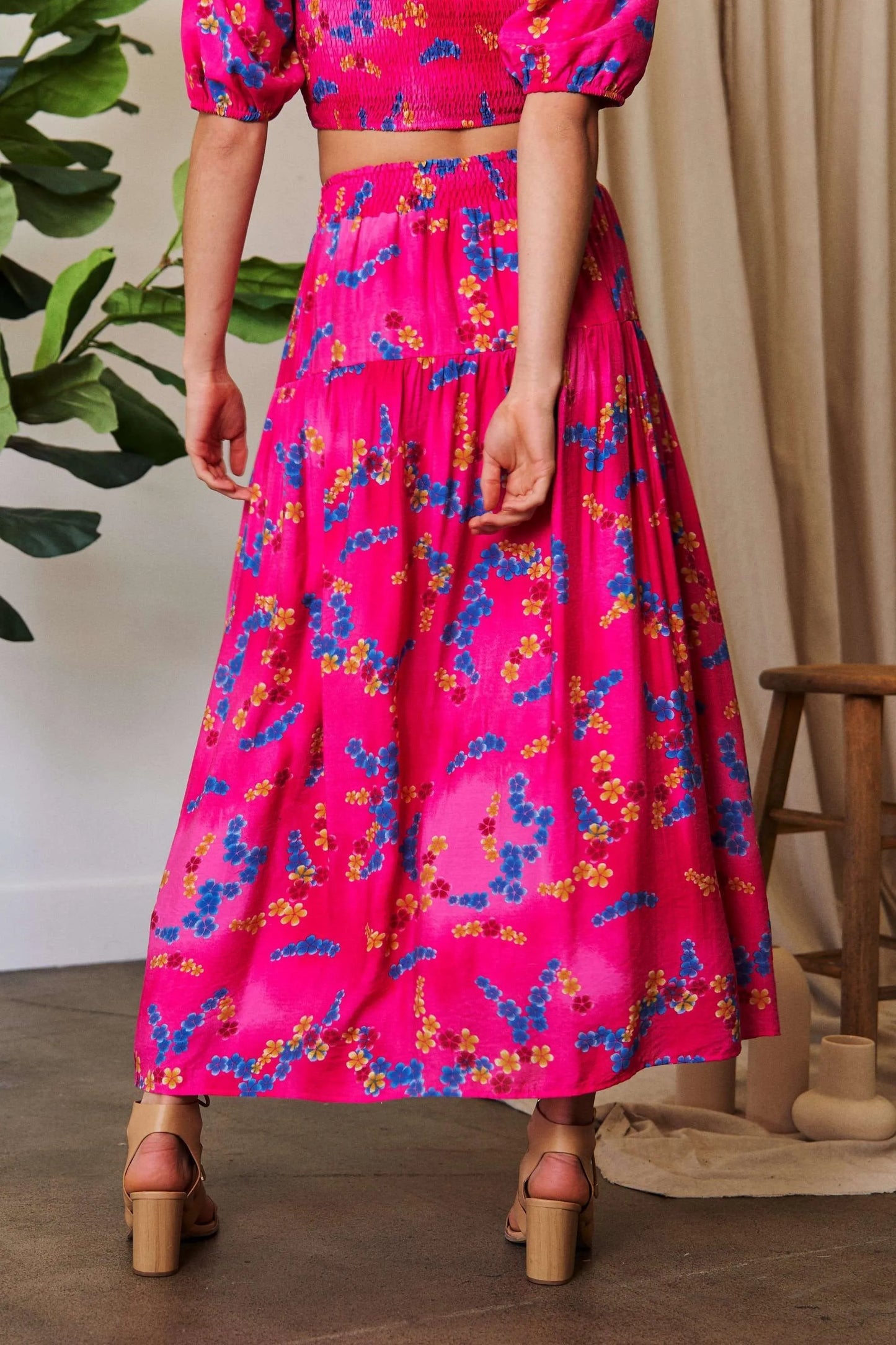 Vibrant pink Davi & Dani floral maxi skirt with smocked high waistband