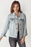 Risen distressed light-wash denim jacket with black buttons