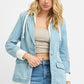 RISEN light blue denim blazer with white drawstring hood and cuffs