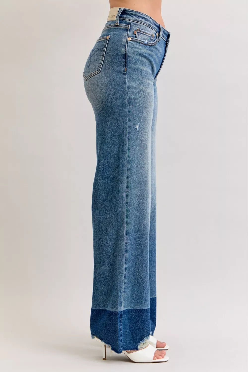 Judy Blue raw hem high-waist light blue flare jeans with distressed details