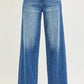 RISEN slouchy baggy jeans in blue denim with five-pocket design and faded wash