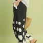 Black Umgee hexagon print wide leg pants with ruffled cuffs