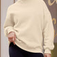 Cream-colored oversized mock neck dropped shoulder sweatshirt with ribbed cuffs