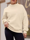 Cream-colored oversized mock neck dropped shoulder sweatshirt with ribbed cuffs