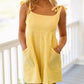 Daverri yellow ribbed knit sundress with tie-sleeve straps and pockets